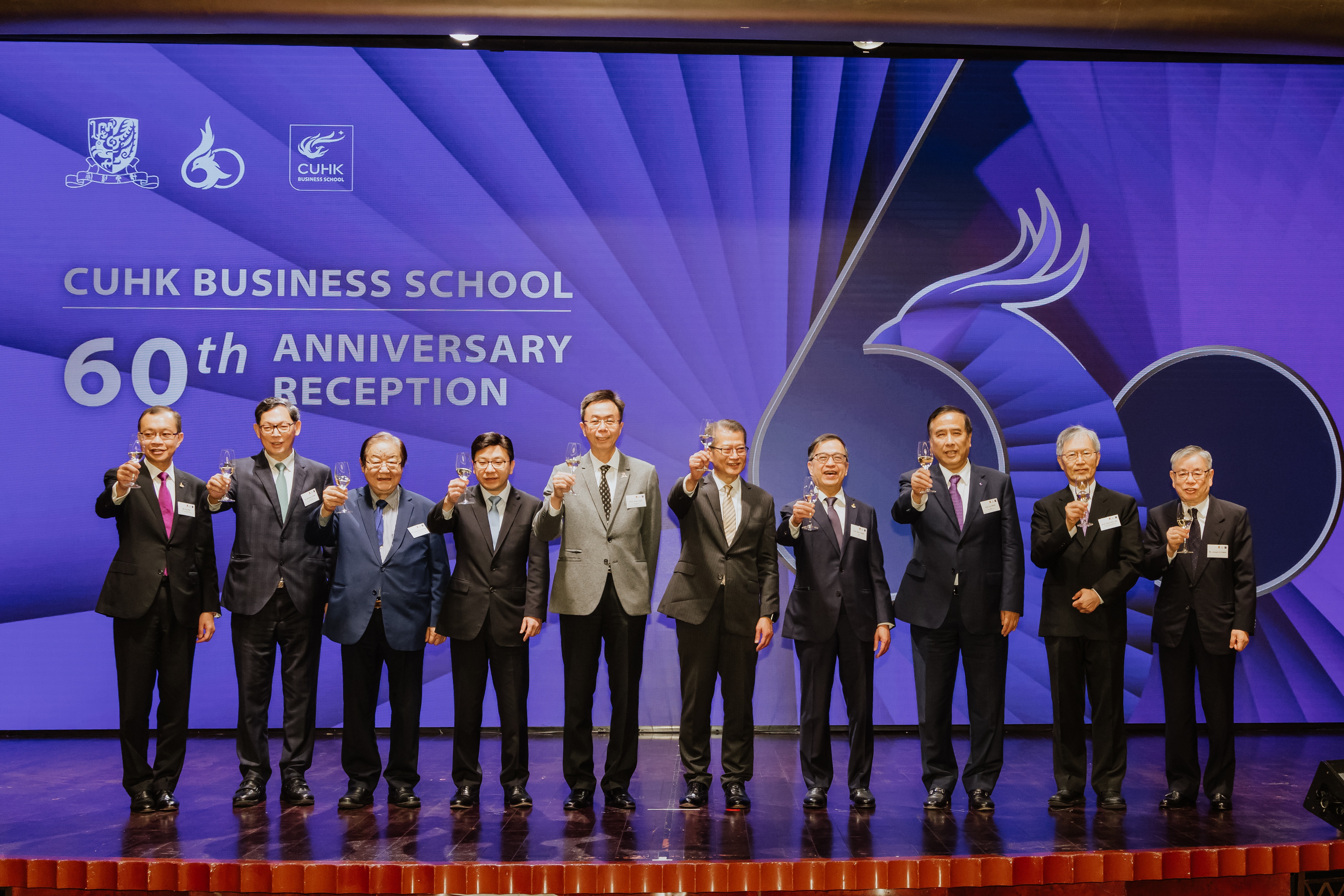 (From left) Mr Eric Ng, Vice-President (Administration) and University Secretary of CUHK, Dr Norman Chan, Honourary Professor of CUHK, Professor Ambrose King, Former Vice-Chancellor of CUHK, Mr Chris Sun, Secretary for Labour and Welfare, Professor John Chai Yat-chiu, Chairman of CUHK Council, Mr Paul Chan Mo-po, Financial Secretary, Professor Alan Chan, Provost of CUHK, Professor Zhou Lin, Dean of CUHK Business School, Professor Lee Kam-hon, Emeritus Professor and Former Dean of CUHK Business School and Mr Joseph Man Kwok-kei, Graduate from the 1st Cohort of CUHK MBA Programme, officiated at the CUHK Business School 60th Anniversary Reception.