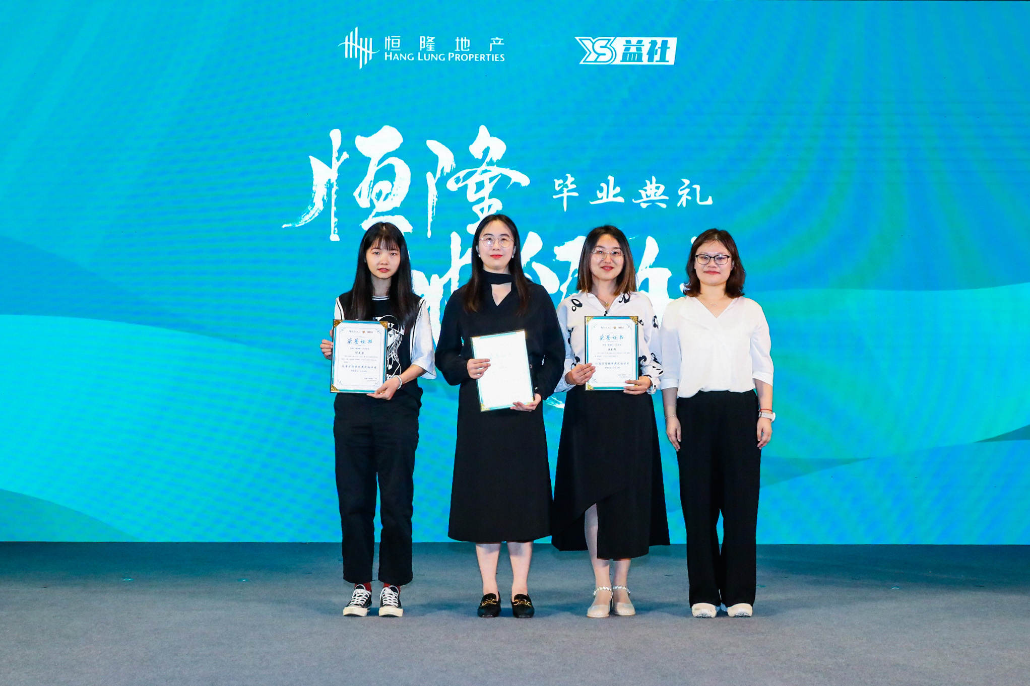 Ms. Chen Yang (far right), Deputy Secretary of Jing'an Youth League Committee, presents awards to the Outstanding Sustainable Community Project teams