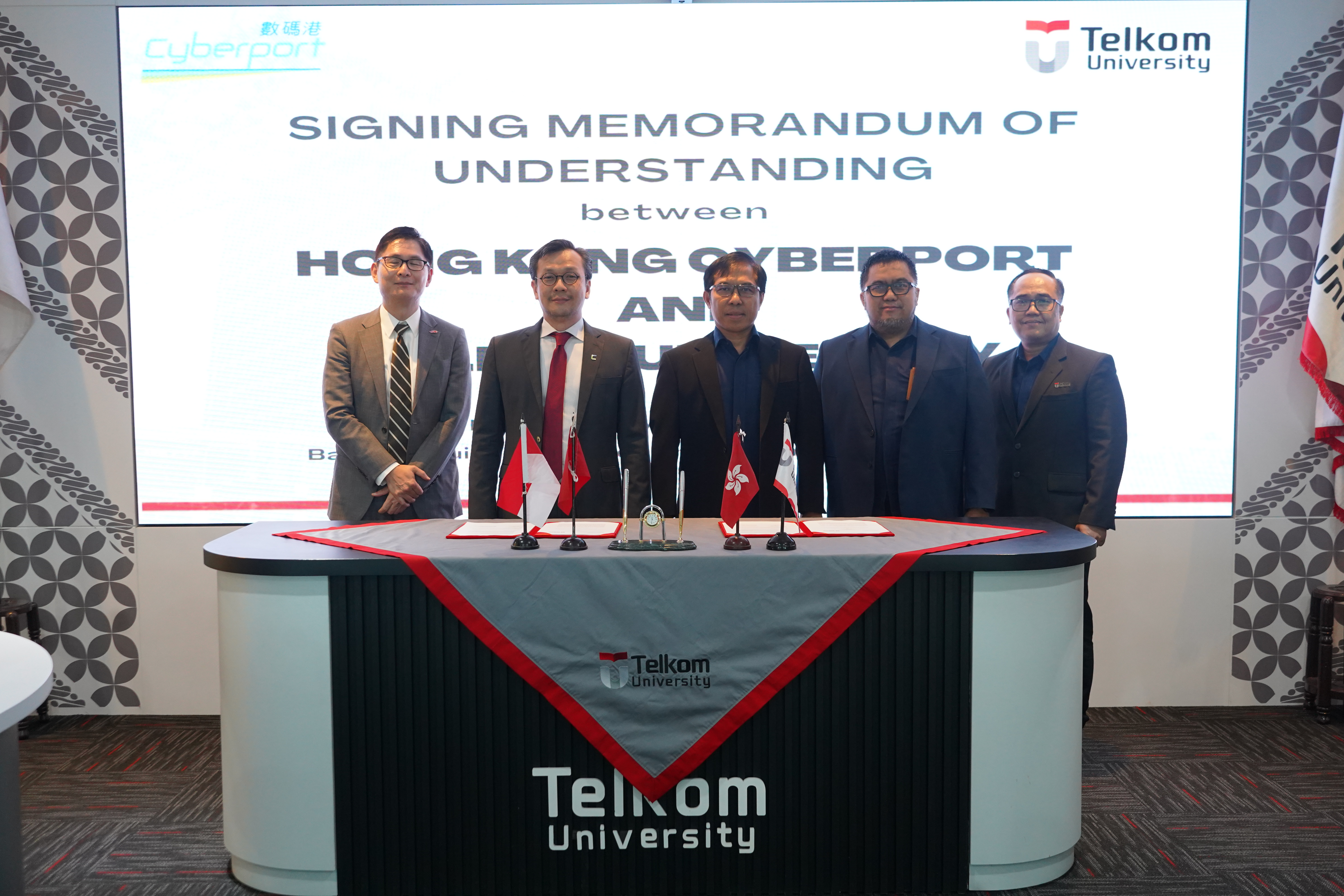 Cyberport formed partnership by exchanging a Memorandum of Understanding (MoU) with Telkom University (Tel-U) on 17 November 2025, Indonesia’s leading private technology university, and its innovation hub, Bandung Techno Park, to deepen collaboration between Hong Kong and Indonesia in innovation and technology. Dennis Tedja, Cyberport Ambassador for Indonesia (second from left), and Professor Dr Suyanto, S.T., M.Sc Rector of Telkom University (third from right), exchanged the MoU in Indonesia.