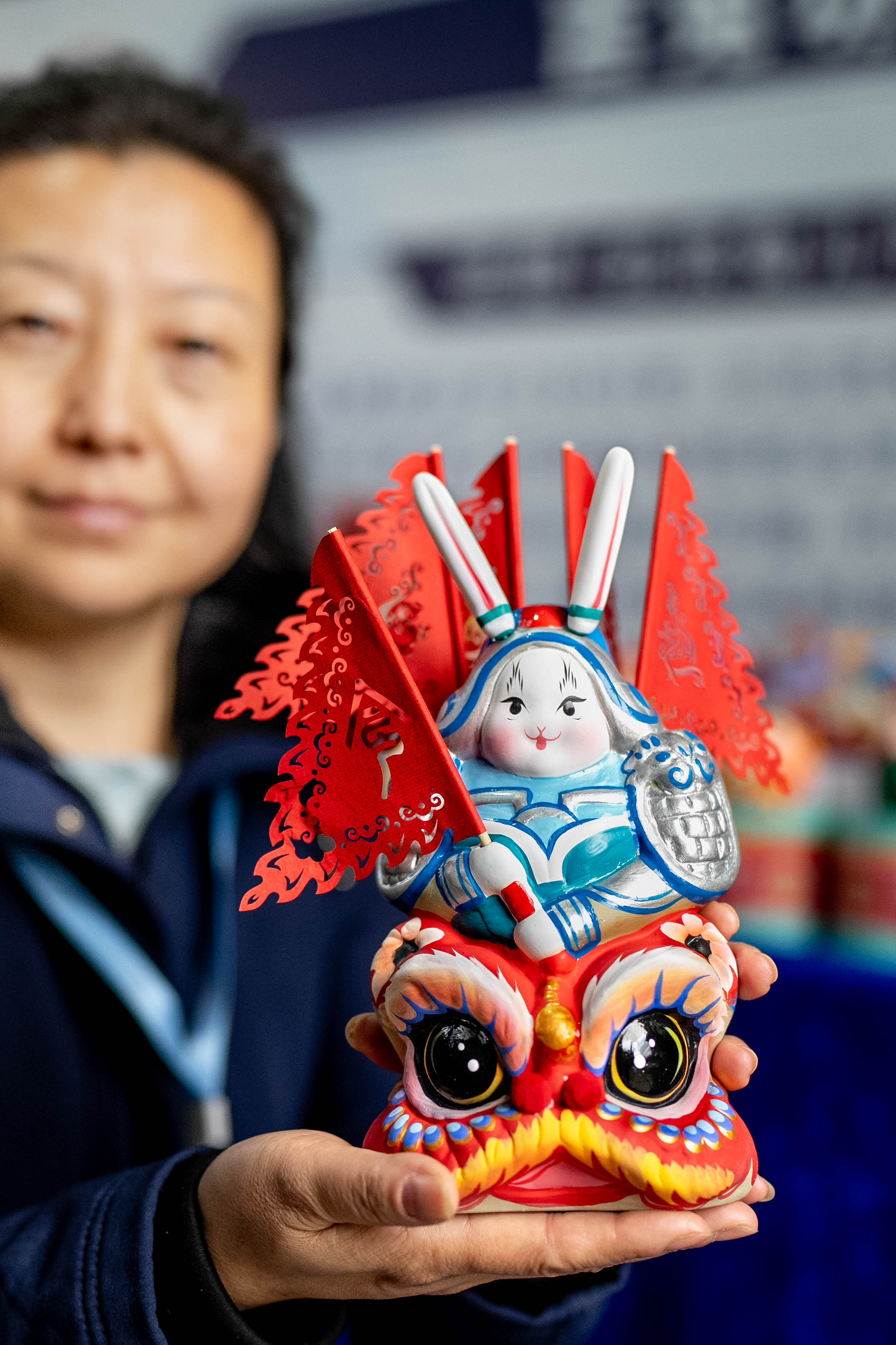 Caption: A staff member displays a Lord Rabbit, known as Tu